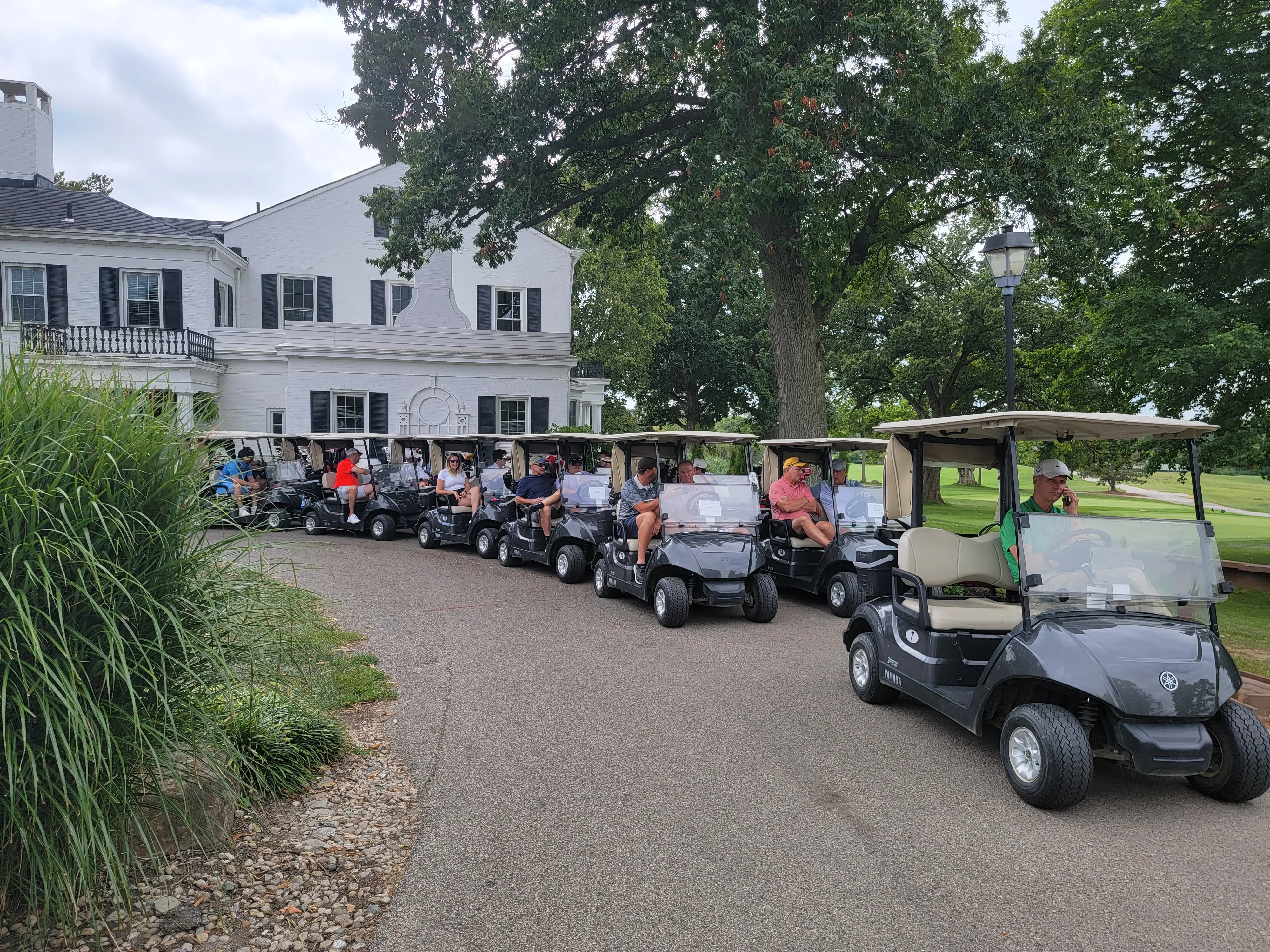 Row of golf carts ready at outing